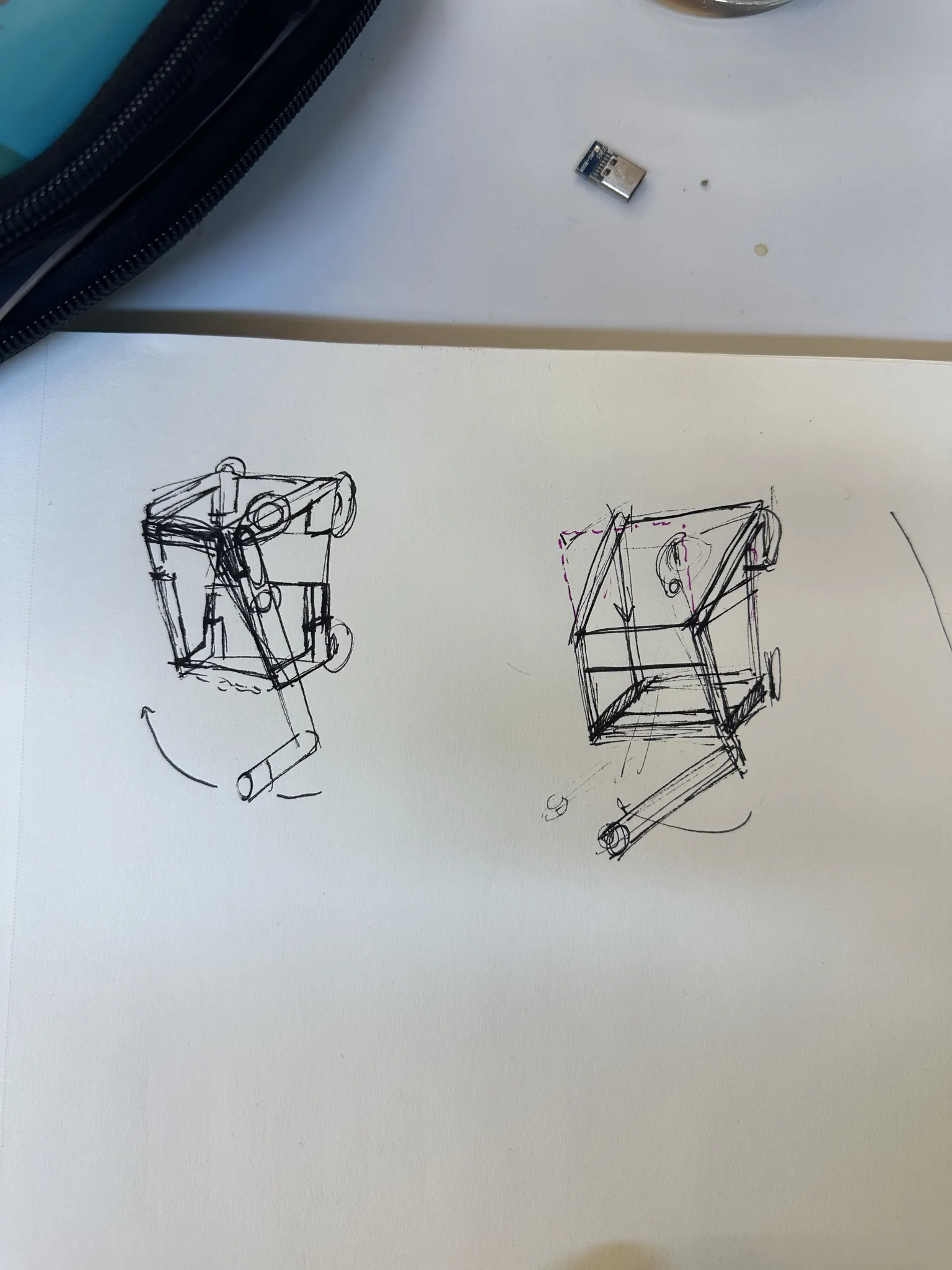 A page of pen sketches working out the hollow frame, drawn from a few angles with the pendulum arm inside.